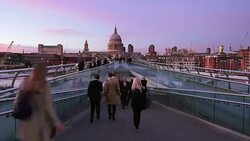 T/L People Moving On London Millennium Bridge At Dusk Stock Footage