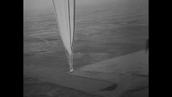 Albert Stevens and Orvil Anderson with balloon gondola Explorer II in 1935 News Clip