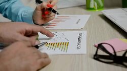 Teamwork with two business people in office with business analysis Stock Footage