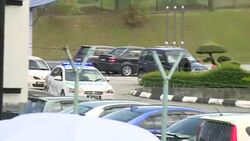CLEAN : Media gather at Malaysia police station after N.Korea death News Clip