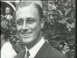 New York State Senator Franklin D. Roosevelt and Assemblyman Jimmy Walker smile and talk with constituents. News Clip