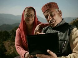 People of Himachal Pradesh: Senior couple using laptop computer Stock Footage