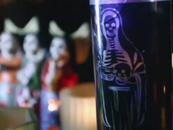 MS R/F Still life of candles and skull figurines / Jacksonville Beach,Florida Stock Footage