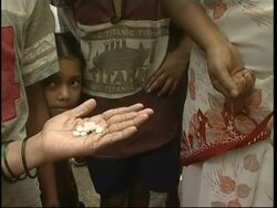 Aid is distributed as water levels ease up News Clip