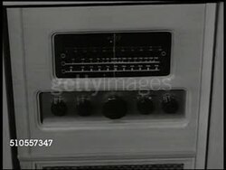 1950: U.S. PRESIDENT TRUMAN IN HOMES: INT VS Family listening to radio, CU Radio dial, Pres. Harry Truman VO '...cost of living... the government is not putting on mandatory ceiling prices & wages...' Korean War Instructional Video