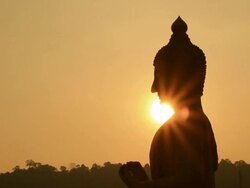 Sunset side big buddha statue silhouette. Stock Footage