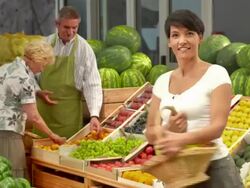 HD: Portrait Of A Happy Woman In Greengrocer'S Shop Stock Footage