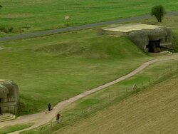 LOW AERIAL, German bunkers, Pointe du Hoc, Normandy, France Stock Footage