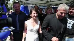 CLEAN : Israeli bride votes in wedding dress News Clip