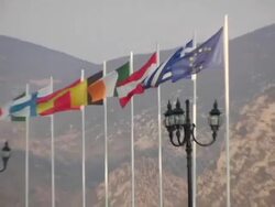 MS, ZI, Row of national flags along mountain road, Greece Stock Footage