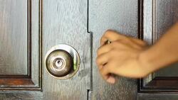 open wooden modern door with one hand Stock Footage