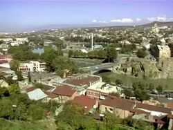 WS PAN View of City of tbilisi with Mtkvari river with Metechi Bridge and old city/ Tbilisi, Georgia  Stock Footage