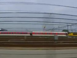 Tracking time-lapse of a train depot in a small town Stock Footage