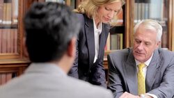 Lawyers talking in office Stock Footage