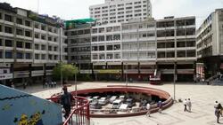 A top view of the busy Nehru Place market and it's underground parking, New Delhi, India Stock Footage