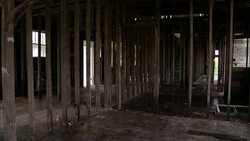 The interior of a building damaged by floods after Hurricane Katrina is gutted out. Stock Footage
