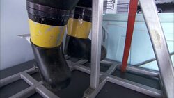 Plastic-coated boots stand in a submarine. Stock Footage