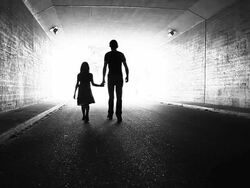 Young man leading little girl to heaven. Stock Footage