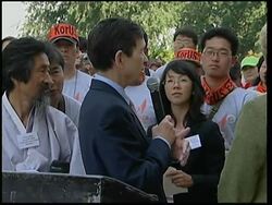 Protests continue as US and South Korea discuss a free trade pact News Clip