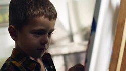 Little boy painting Stock Footage