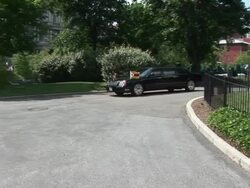 June 2009 WS PAN ZI Limousine carrying Zimbabwean Prime Minister, Morgan Tsvangirai, arriving on the grounds of the White House/ Washington DC, USA/ AUDIO Stock Footage