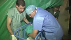 Syrian women gives birth in refugee camp after fleeing her war torn country Instructional Video