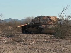 WS Broken down tank in the desert Stock Footage
