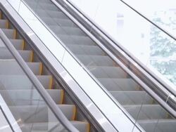 MS Businessman walking down escalator / Seattle, Washington, United States Stock Footage