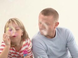 Blowing Soap Bubbles Stock Footage