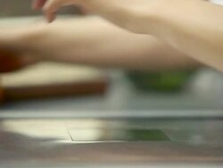 Cashier weighing and scanning items at supermarket checkout, close up Stock Footage