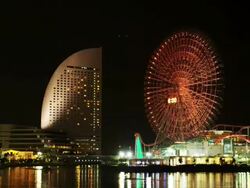 The Cosmo World Ferries Wheel and the Intercontinental Hotel early evening, Yokohama, Japan. Time lapse. Stock Footage