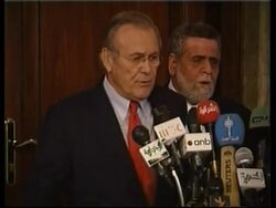 Rumsfeld comments on troop reduction at presser News Clip