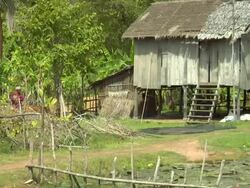 ZO rural homes built on posts / Cambodia Stock Footage