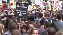 CLEAN : Tens of thousands CLEAN : march through London for migrants News Clip