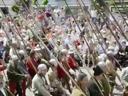 MS PAN Shot of Lance servants at Medieval party showing marriage of 1475 with medieval clothing, Landshuter Hochzeit 1475 / Landshut, Bavaria, Germany Stock Footage