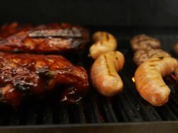 Ribs and Sausage on the Grill Stock Footage