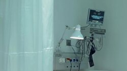 Computer monitor showing time in hospital ward Stock Footage