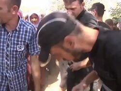 Yazidi Refugees Receive Food Aid News Clip