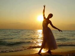 Ballerina dancing with the sun Stock Footage