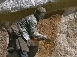 MS Kids playing front of buddhist chorten tower / Saldang village, High Himalayas, Upper Dolpo near Tibetan border, Nepal  Stock Footage
