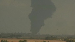 CLEAN : Smoke rises from Gaza following an Israeli shelling News Clip