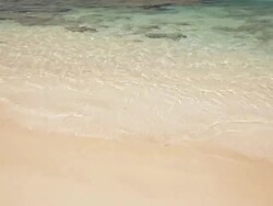 MS View waves crashing on beach / Moloaa Beach Kauai, Hawaii, United States Stock Footage