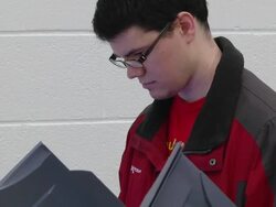 MS ZO Shot of First time voter casts his ballot in presidnetial election / Sylvania, Ohio, United States  Stock Footage