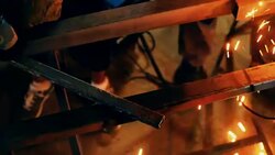 Welding and grinding metal at a factory. Stock Footage