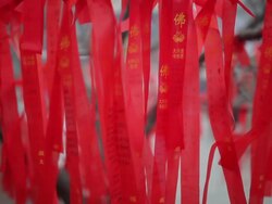 CU Shot of Blessing words on red ribbon for good luck in temple / Xi'an, Shaanxi, China Stock Footage