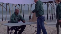 Volunteers line up for check in Stock Footage
