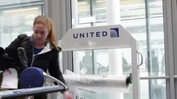 CLEAN : Travelers react to passenger being dragged off United flight News Clip