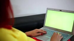 Woman is working with laptop Stock Footage