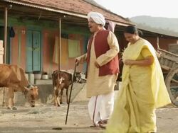 Man touching toes of his parents  Stock Footage