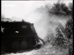 B/W 1960's smoke from battle surrounding tank / Vietnam / SOUND Stock Footage